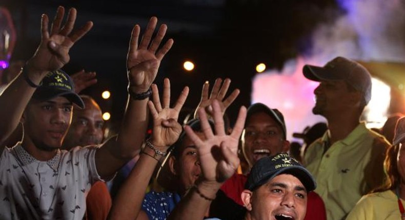 Dominican president celebrates reelection, sporadic violence flares