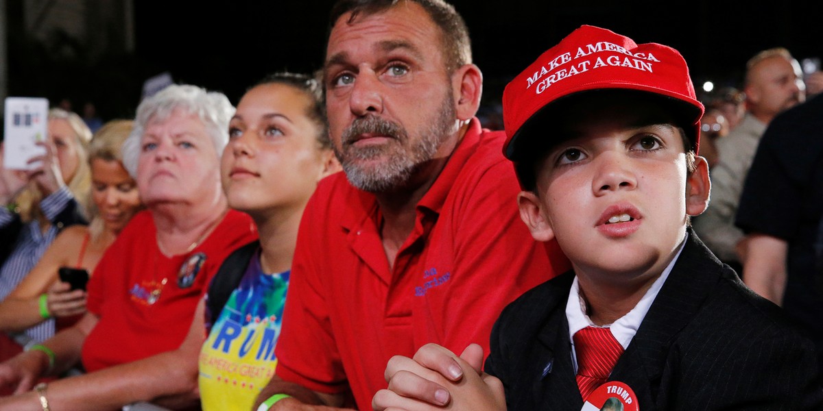 Supporters rally with Republican U.S. presidential nominee Donald Trump in Tampa, Florida, U.S. October 24, 2016.