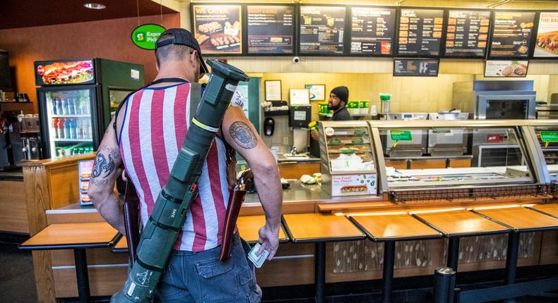 Rocket launcher protester North Carolina Subway photo picture