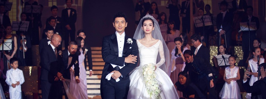 151009 SHANGHAI Oct 9 2015 Actor Huang Xiaoming and actress Angelababy walk together d