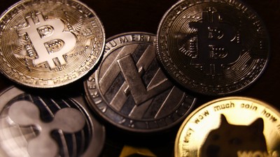 A representation of cryptocurrencies including bitcoin and dogecoin are seen in this illustration photo.Jakub Porzycki/NurPhoto via Getty Images