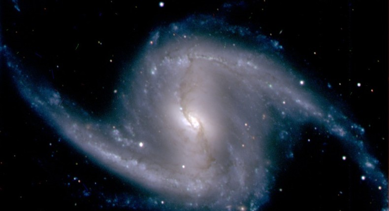 Spiral galaxy NGC 1365 observed from Chile in 2012 -- a new method gauges how to measure the universe's accelerating growth