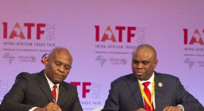 Dr Benedict Oramah and Tony Elumelu signing the Afrexim deal at the first-ever Intra-African Trade Fair in Cairo