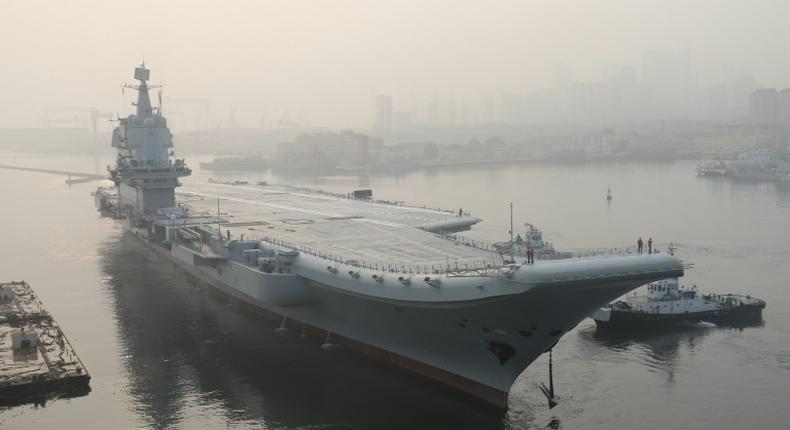 China's first domestically manufactured aircraft carrier, shown here in Dalian, sailed through the Taiwan Strait