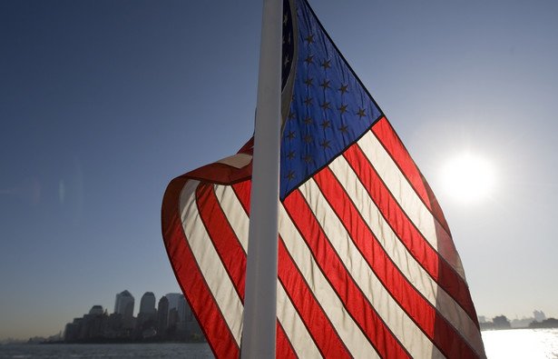 Flaga USA, fot. Andrew Harrer/Bloomberg News