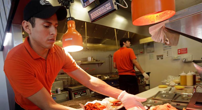 About 12% of recent immigrants worked in the accommodation and food services industry, compared to 7% of US-born workers. AP Photo/Alan Diaz