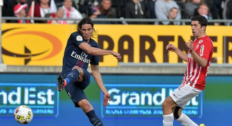 Edinson Cavani (left) scored again as Paris Saint-Germain beat Ligue 1 strugglers Nancy 2-1