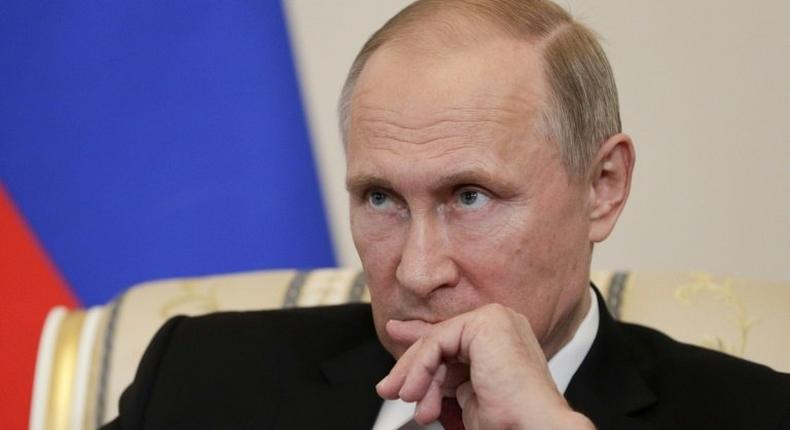 Russian President Vladimir Putin says US intelligence leaker Edward Snowden is not a traitor