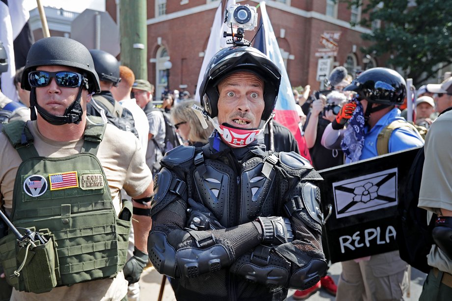 White nationalists, neo-Nazis and members of the "alt-right" exchange insults with counter-protesters during the "Unite the Right" rally in Charlottesville, Virginia, August 12, 2017.