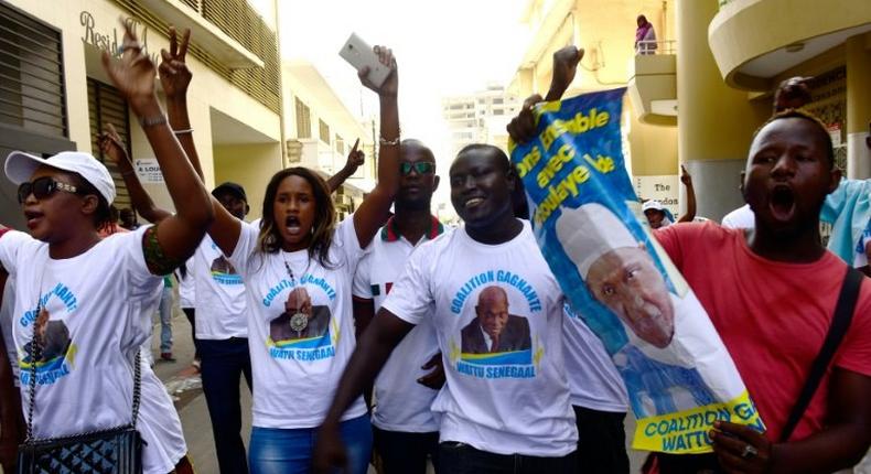 Some supporters of former Senegalese president Abdoulaye Wade were tear-gassed when they tried to reach Independence Square for a protest over voting rights