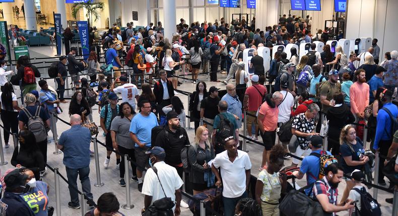 Travelers thronged the security checkpoint over the summer in Orlando. Transportation Security Administration screenings rose above 2019 figures in October, according to a Bank of America report.SOPA Images/Getty Images