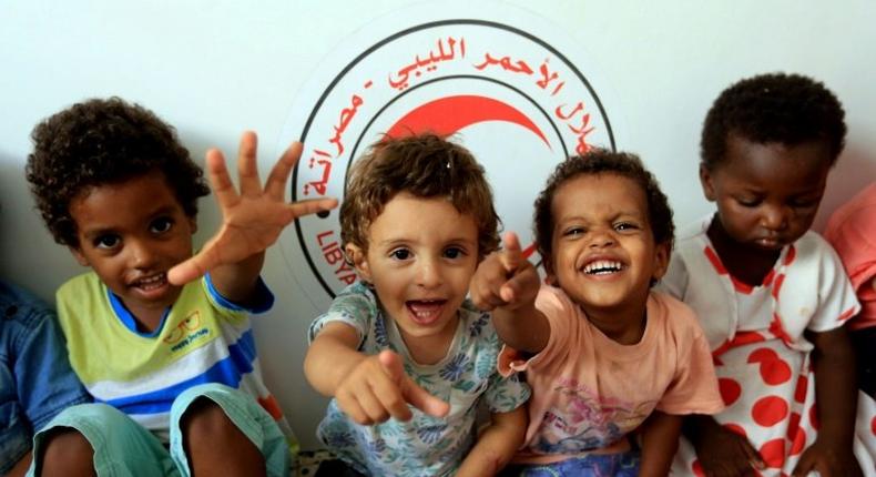 A picture taken on August 2, 2017 shows children of Islamic State group fighters now living in the Libyan Red Crescent headquarters in Misrata, a town half-way between Sirte and Tripoli