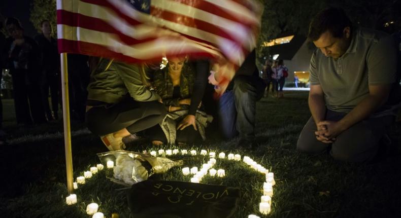 A vigil in honor of 12 people killed in a California bar shooting in November 2018 -- even the most shocking of massacres can fail to move the needle on gun control in America