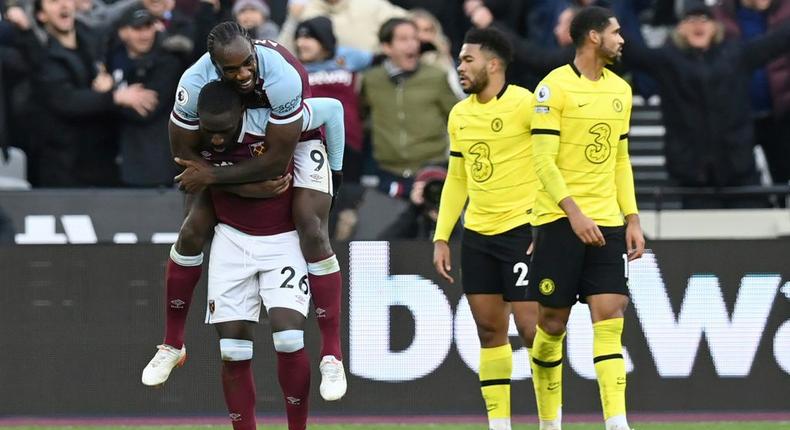 West Ham defender Arthur Masuaku (L) celebrates with  midfielder Michail Antonio after scoring the Premier League winner against Chelsea at the weekend. Creator: Glyn KIRK