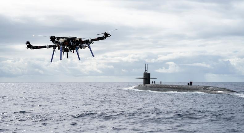 201019-N-LI768-1111 PACIFIC OCEAN Oct. 19, 2020 -- An unmanned aerial vehicle delivers a payload to the Ohio-class ballistic-missile submarine USS Henry M. Jackson (SSBN 730) around the Hawaiian Islands.U.S. Navy photo by Mass Communication Specialist 1st Class Devin M. Langer/Released