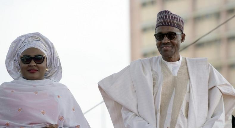 Nigerian President Mohammadu Buhari arrives with his wife Aisha, before taking oath of office in Abuja, on May 29, 2015