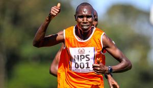 National Police Service Geoffrey Kamworor celebrates his lead ahead of Daniel Simiu in 10km senior men on January 6, 2023 during the National Police Service National Cross Country Championship, at Ngong race Course, Nairobi. Photo/CHRIS OMOLLO Copyright: xChrisxOmollox
