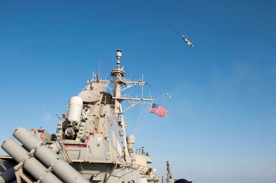 An U.S. Navy picture shows what appears to be a Russian Sukhoi SU-24 attack aircraft flying over the U.S. guided missile destroyer USS Donald Cook in the Baltic Sea