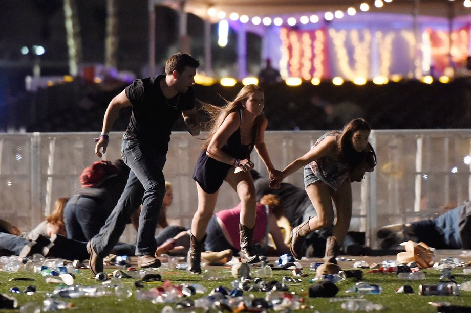 Concertgoers flee gunfire at a country-music festival in Las Vegas, October 1, 2017.