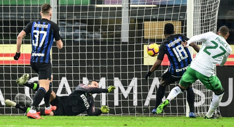 Inter Milan goalkeeper Samir Handanovic rescued a point, denying Sassuolo's Ghanaian forward Kevin-Prince Boateng