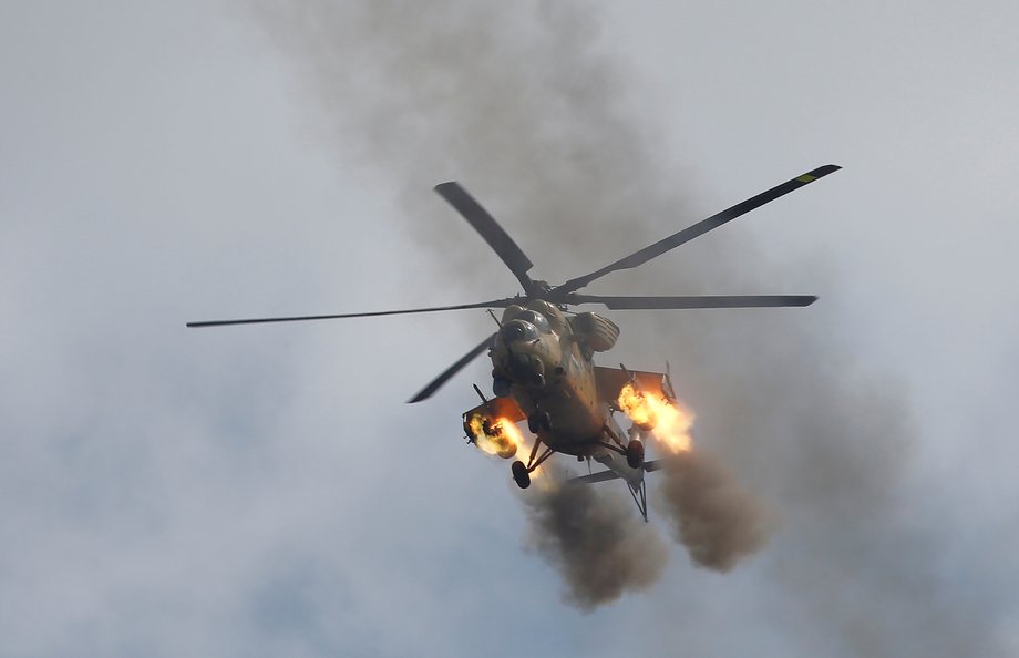 An Iraqi air force helicopter fires missiles against ISIS militants during a battle in Mosul, March 17, 2017.