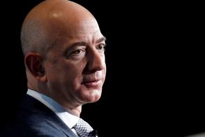 FILE PHOTO: Jeff Bezos, founder of Blue Origin and CEO of Amazon, speaks about the future plans of B
