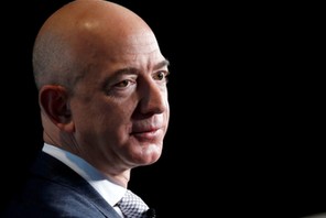 FILE PHOTO: Jeff Bezos, founder of Blue Origin and CEO of Amazon, speaks about the future plans of B