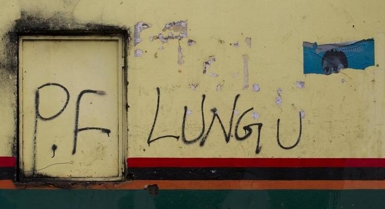 Patriotic Front (PF) Presidential candidate Edgar Lungu's name appears on a shop wall in Lusaka, January 20, 2015. 