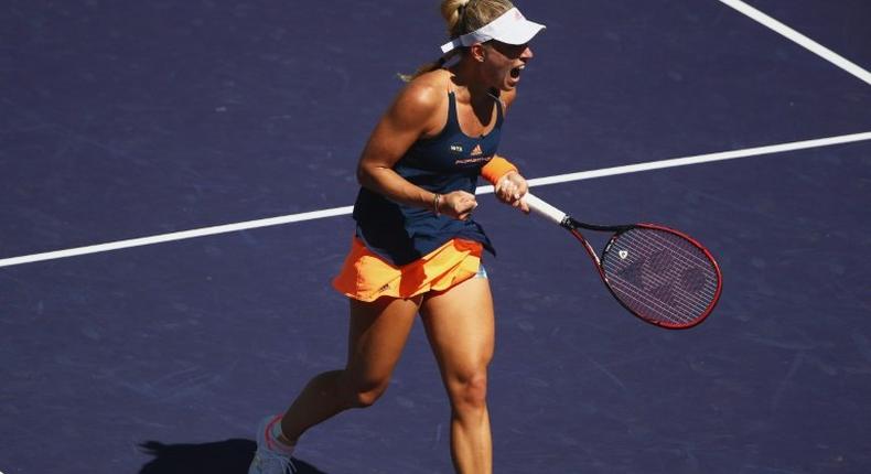 Angelique Kerber of Germany celebrates winning the first set against Pauline Parmentier of France, in Indian Wells, California, on March 13, 2017