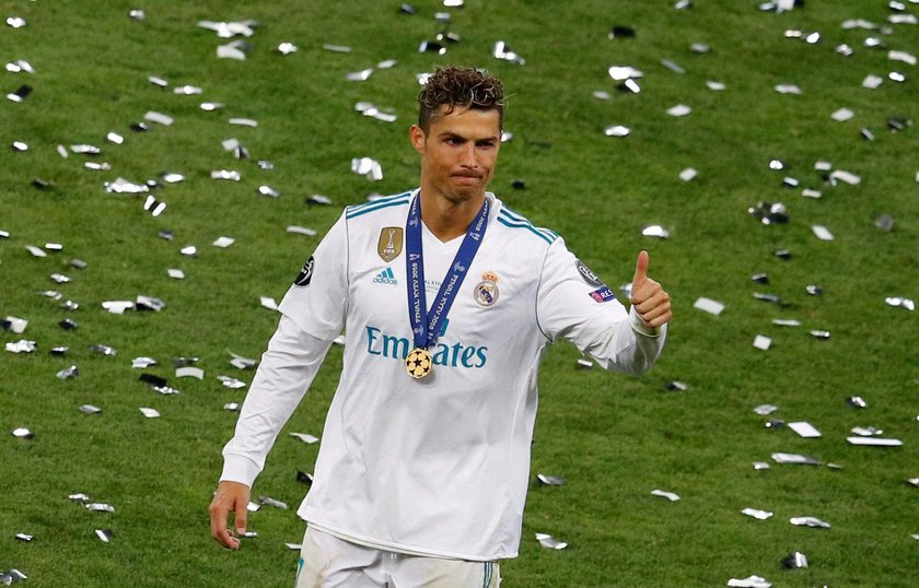 FILE PHOTO: Real Madrid's Cristiano Ronaldo celebrates after winning the Champions League in Kiev, U