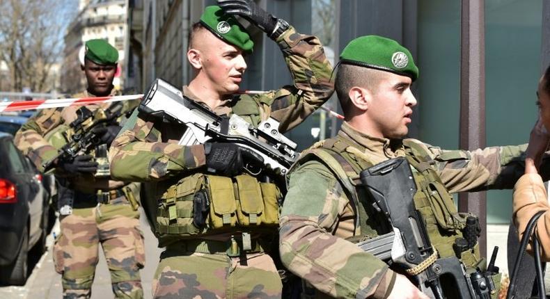 French troops on duty near the Paris offices of the International Monetary Fund on March 16, 2017