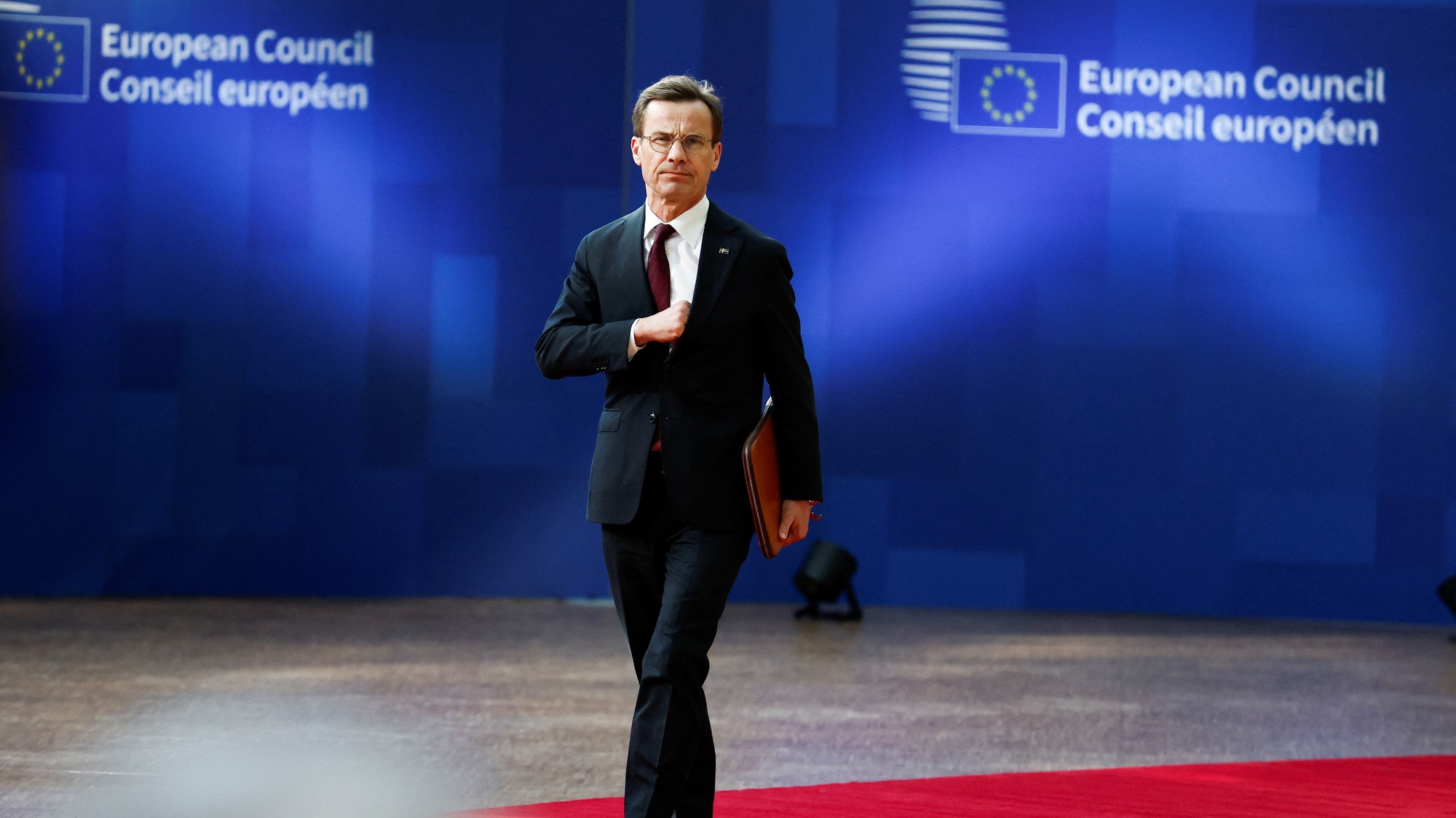 Švédsky premiér Ulf Kristersson, REUTERS/Stephanie Lecocq