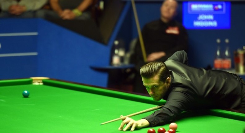 England's Mark Selby plays during the World Championship Snooker final against Scotland's John Higgins at The Crucible in Sheffield, England on May 1, 2017