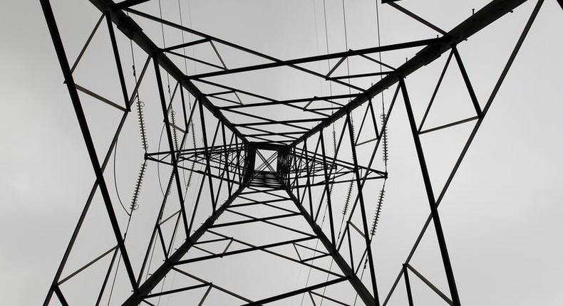 A high voltage electrical pylon stands on the outskirts of Kenya's capital Nairobi, March 14, 2011. REUTERS/Thomas Mukoya