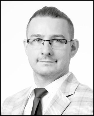 Bartosz Mazur, doradca podatkowy i partner w Gekko Taxens