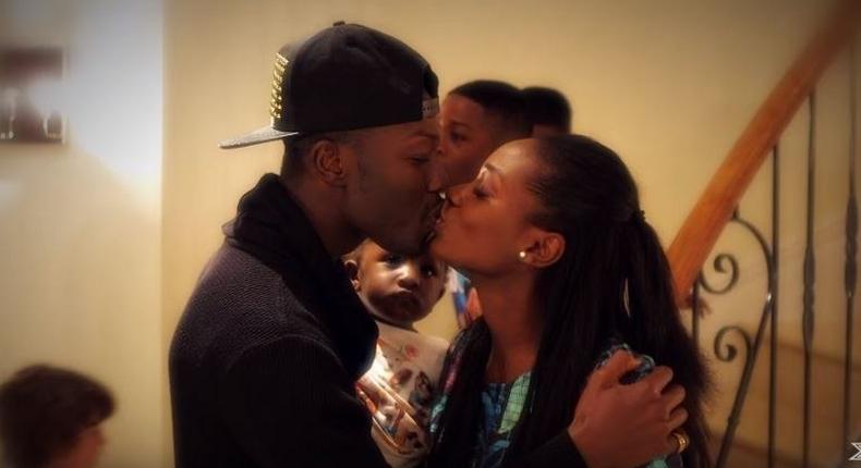 Reggie Zippy kisses wife