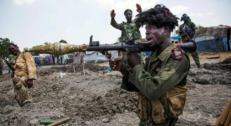 Soldiers of the Sudan People Liberation Army are in Lelo, northern South Sudan, on October 16, 2016 after heavy fighting broke out two days earlier