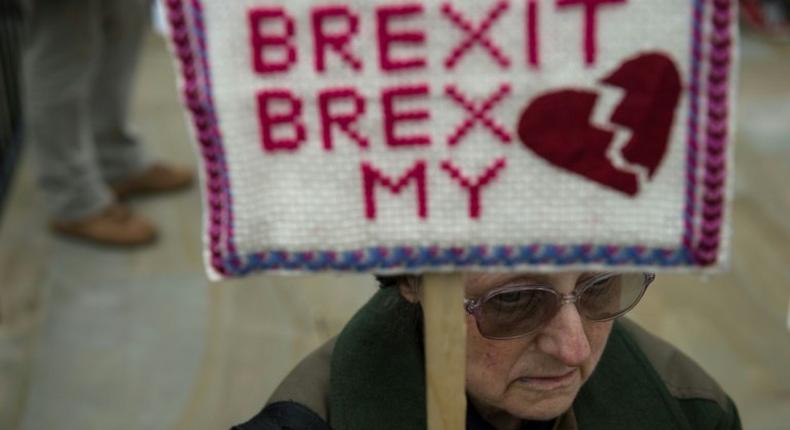 An anti-Brexit protester opposite Downing Street in London after Britain formally began the process of withdrawal from the EU