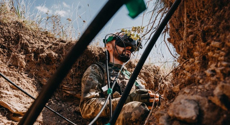 A Ukrainian drone operator from the 24th Separate Mechanized Brigade tests an FPV drone in Donetsk Oblast, Ukraine, in August 2023.Wojciech Grzedzinski/Anadolu Agency via Getty Images