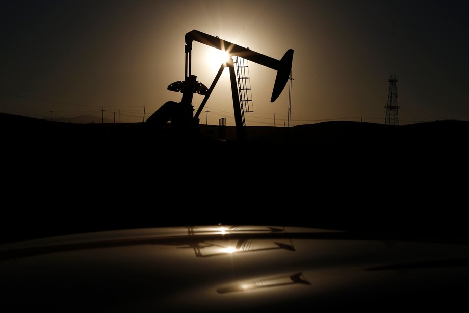 A pump jack is seen at sunrise near Bakersfield, California.