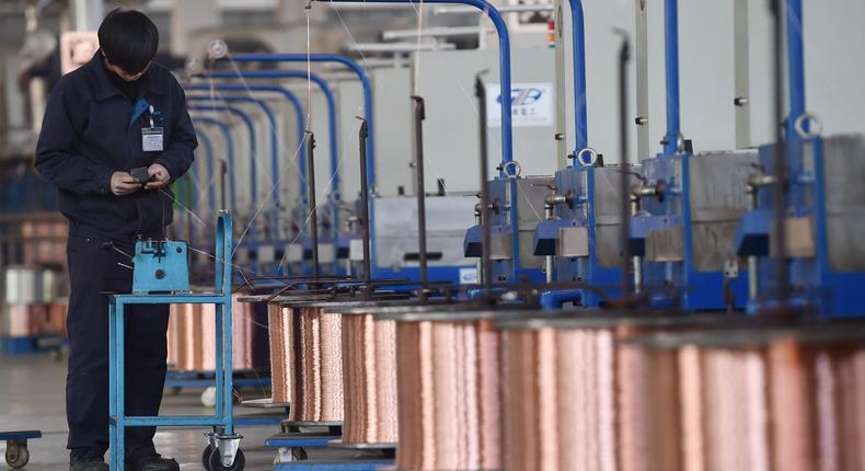 An employee produces copper wires at Nanjing Gree Electric Enterprise Co. in China.Fang Dongxu/VCG via Getty Images