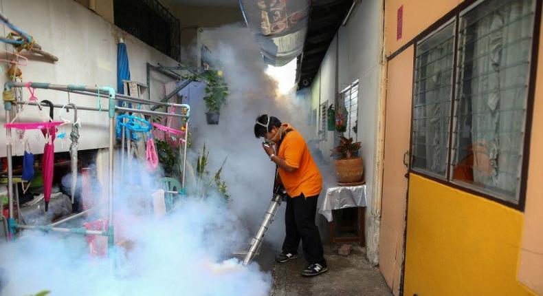 Thailand has confirmed two cases of microcephaly caused by the Zika virus, the first time the A city worker fumigates the area to control the spread of mosquitoes at a university in Bangkok, Thailand, September 13, 2016. REUTERS/Athit Perawongmetha/File Photo