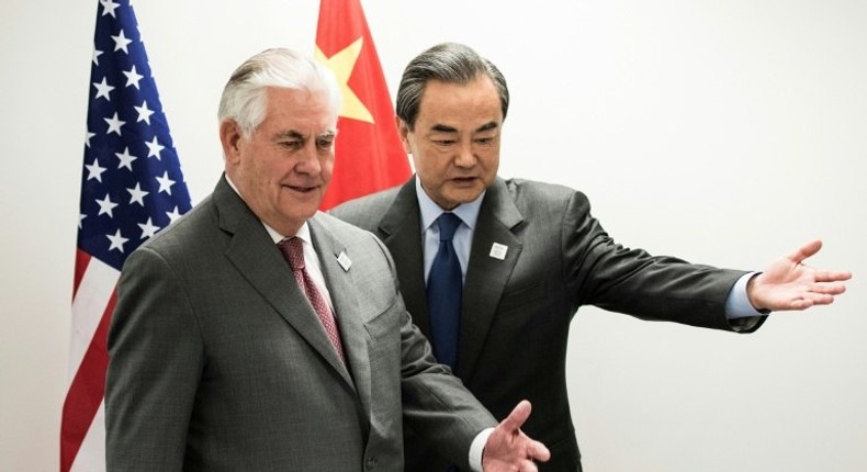 US Secretary of State Rex Tillerson (L) and China's Foreign Minister Wang Yi meet on the sidelines of athe G20 in Bonn, western Germany, February 17, 2017