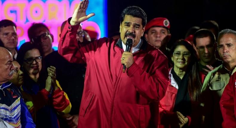 Venezuelan President Nicolas Maduro, shown in this July 31 file photo, says he's willing to travel by motorbike or mule to make his plane available to his country's athletes