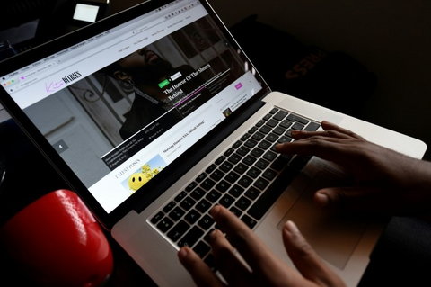 Nigerian internet fraudsters dubbed "Yahoo Boys" post fake profiles on gay dating sites then force the victim to pay money for their silence (AFP)