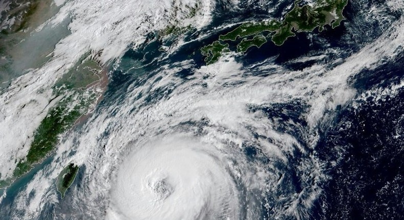 Typhoon Trami is shown off the Japanese south coast in the Philippine Sea in this NOAA/RAMMB satellite image