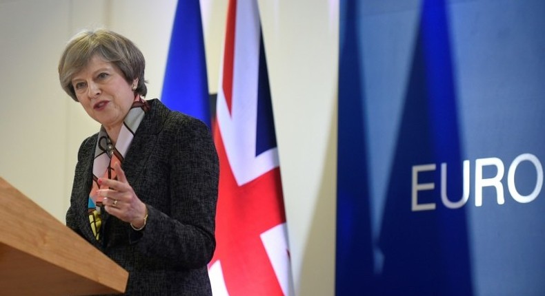 British Prime Minister Theresa May holds a press conference during a European Summit at the EU headquarters in Brussels on March 9, 2017