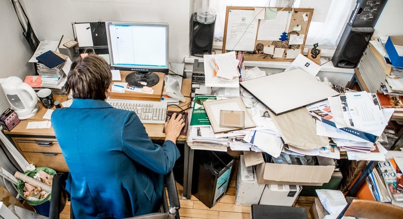 A messy desk may be affecting your productivity at work.CasarsaGuru/Getty Images