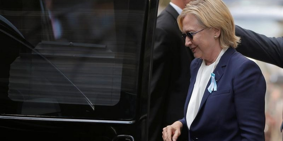 US Democratic presidential candidate Hillary Clinton climbs into her van outside her daughter Chelsea's home in New York.