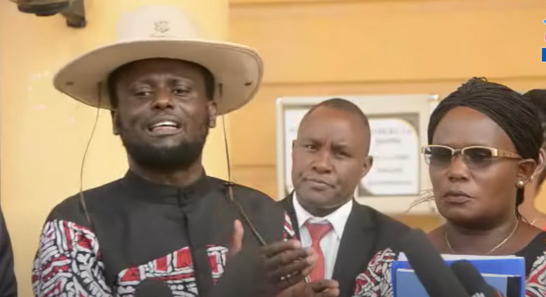 Meru Governor Kawira Mwangaza with her husband Murega Baichu while addressing the media in Nairobi on October 28, 2022